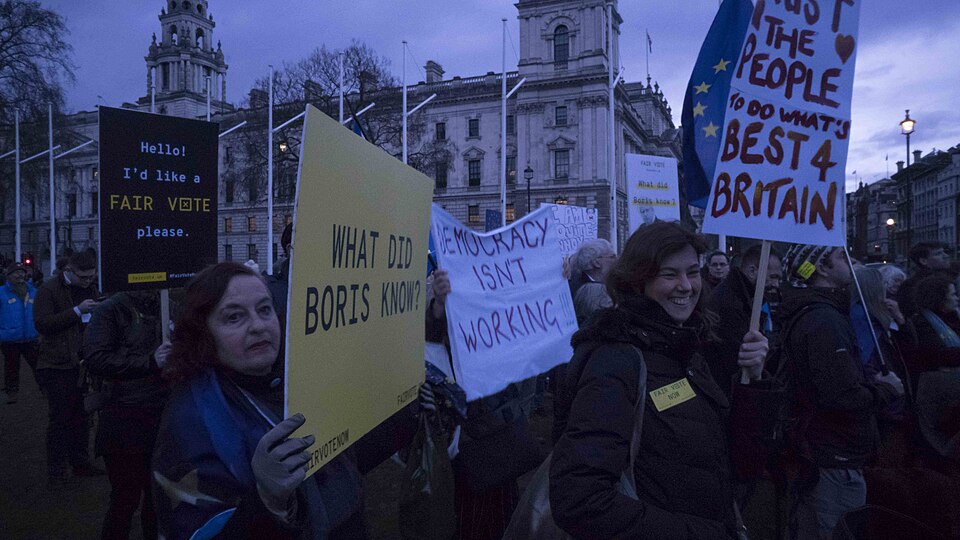 Photograph of a protest in Parliament Square related to Cambridge Analytica